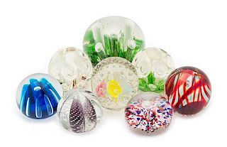* A Collection of Glass Paperweights Diameter of largest 5 1/2 inches
