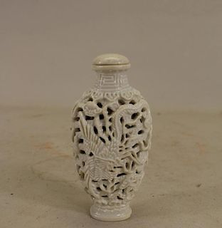 Chinese Reticulated Porcelain Dragon Snuff Bottle