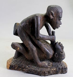 African Wood Carved Fighting Sculpture