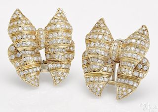 Pair of 18K yellow gold diamond bow earrings
