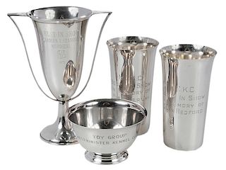 Four Sterling Dog Trophies