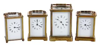 Four Brass and Beveled Glass Carriage Clocks