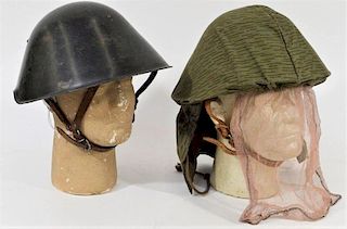 East German Steel Helmets one w/ Camouflage Cover