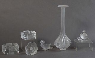 Group of Six Pieces of Lalique Crystal, 20th c., consisting of an "Anemone Ouvert" ornament; a tall bulbous vase designed by 