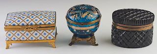 Group of Three Boxes, 20th c., consisting of a Limoges Porcelain and brass jewelry box; an oval black glass and brass dresser