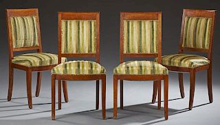 Set of Four French Empire Style Dining Chairs, late 19th c., the curved tablet crest rails over upholstered backs and upholst