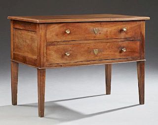 French Louise Philippe Carved Walnut Commode, 19th c., the rectangular stepped top over two long drawers, the raised on squar