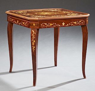 Italian Floral Marquetry Inlaid Mahogany Games Table, 20th c., with a floral inlaid canted corner top and apron, the top lift