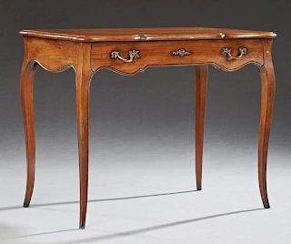 French Louis XV Style Carved Cherry Writing Table, 20th c., the serpentine rectangular top over a single drawer, on cabriole 