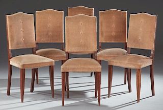 Set of Six French Carved Oak Art Deco Chairs, c. 1930, the arched upholstered button backs over upholstered seats, on tapered