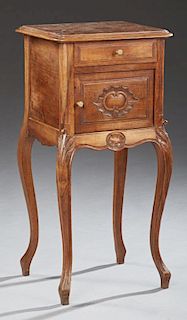 French Louis XV Style Marble Top Nightstand, early 20th c., the inset rouge marble over a frieze drawer and a ceramic lined p