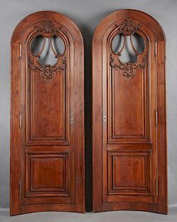 Outstanding Pair of French Louis XV Style Architectural Doors, c. 1860, the arched frames over curved doors with window tops 