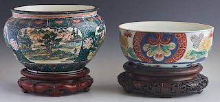 Two Chinese Porcelain Bowls, 20th c., one of baluster form with figural panels; the second with floral decoration, both on ca