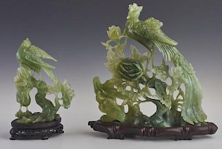 Two Oriental Carved Jadeite Birds Groups, 20th c., on custom fitted carved hardwood stands (2 Pcs.), Larger- H.- 8 3/4 in., W