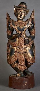 Gilt and Polychromed Figure of a Standing Buddha, 20th c., his elaborate robe inset with mirror "gems," with one hand outstre