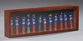 Twelve Whimsical Painted Glass Animal Figures, 20th c., presented in a shadowbox frame, Each- H.- 5 3/4 in., W.- 1 1/4 in. Pr