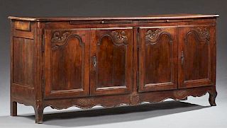 Louis XV Style Carved Cherry Sideboard, 19th c., the rounded corner rounded edge top over two front pull out slides above two