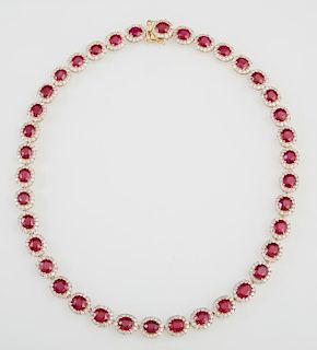 18K Yellow Gold Link Necklace, each of the thirty-eight oval links with a ruby atop a border of round diamonds, total ruby we