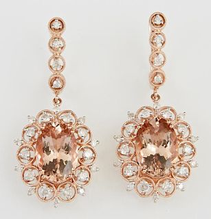 Pair of 14K Rose Gold Earrings, each with a diamond mounted half hoop suspending a pendant with a 5