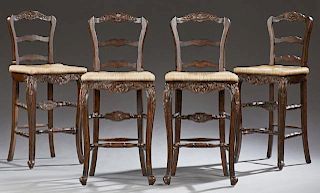 Set of Four French Provincial Style Carved Mahogany Rush Seat Bar Stools, late 20th c., the arched ladderbacks over bowed rus