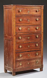 Louis Philippe Style Cherry Commode, late 19th c., the rectangular plank top over five drawers above lower deep drawers, on b