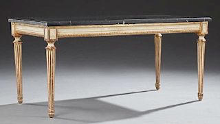 French Louis XVI Style Marble Top Giltwood Coffee Table, 20th c., the stepped edge figured black marble on a parcel gilt and 