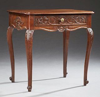 French Louis XV Style Carved Mahogany Lamp Table, 20th c., the stepped rounded edge top over a frieze drawer, on cabriole leg