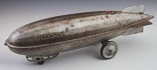 Steelcraft "Akron" Toy Zeppelin, 1920's, with original decals and wheels, together with a photograph of the original "Akron" 