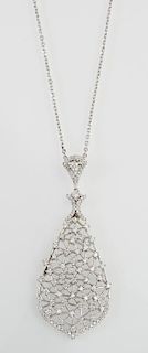 14K White Gold Pendant, of latticed teardrop form, mounted with numerous small round white diamonds with a diamond mounted ba
