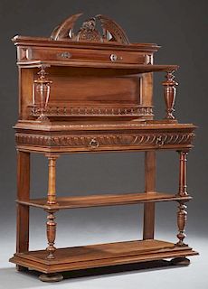 Henri II Style Carved Walnut Marble Top Server, c. 1880, with a broken arch crest over a top shelf, on turned tapered support
