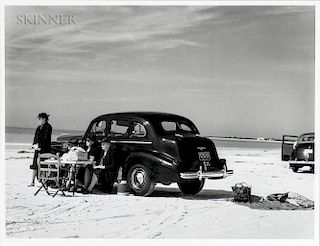 Marion Post Wolcott (American, 1910-1990)  Winter Visitors Picnicking on Running Board of Car on Beach, Sarasota, Florida