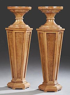 Pair of Carved Walnut Pedestals, late 20th c., the dished circular tops on hexagonal tapered supports, on a stepped hexagonal