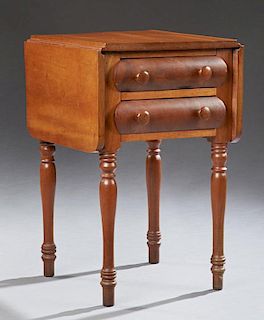American Carved Mahogany Drop Leaf Work Table, late 19th c., the rectangular top over two convex front drawers, on turned tap