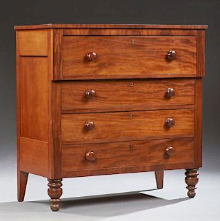 American Classical Revival Mahogany Chest, late 19th c., the rectangular top over a deep drawer above three setback long draw
