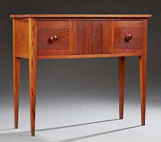 Southern Carved Pine Sideboard, late 19th c., the rectangular top over two center doors flanked by deep drawers, on square ta