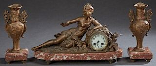 French Three Piece Gilt Spelter and Marble Figural Clock Set, c. 1900, the drum clock, time and strike, with doves on one sid
