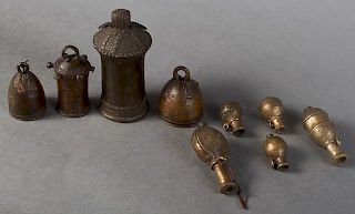 Group of Nine African Benin Bronze Items, 20th c., consisting of four bells and five small jars (9 Pcs.), Largest Bell- H.- 7