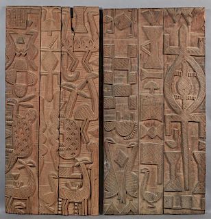 Two African Carved Yoruba Wood Doors, early 20th c., Nigeria or Benin, H.- 53 1/4 in., W.- 27 in.