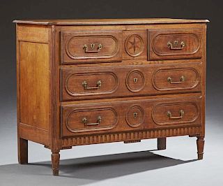 French Louis XVI Style Inlaid Carved Oak Commode, 19th c., the stepped rounded corner top over two frieze drawers above two d