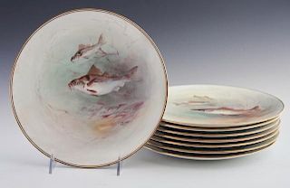 Set of Eight Royal Doulton Fish Plates, early 20th c., each decorated with fish, signed C. Hart, #MB6145, made for Ovington B