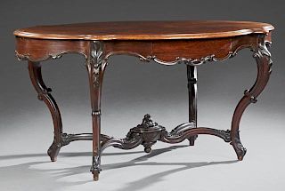 Large French Carved Mahogany Center Table, 19th c., the stepped tortoise top over serpentine skirt with a drawer on each side