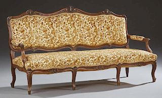 French Louis XV Style Carved Walnut Five Piece Parlor Suite, late 19th c., consisting of a triple seat settee with a serpenti