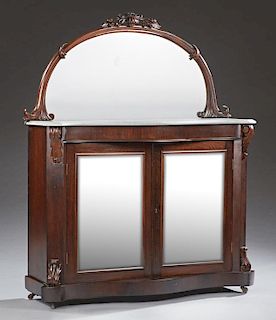 English Victorian Carved Mahogany Marble Top Credenza, 19th c., the arched mirror back over a bowed serpentine figured white 