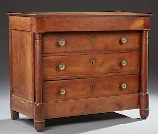 French Empire Style Carved Cherry Commode, 19th c., the rectangular top over a frieze drawer and three setback drawers flanke