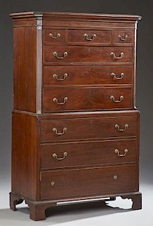 English Carved Mahogany Chest-on-Chest, 19th c., the canted corner stepped ogee crown over an upper section with three frieze