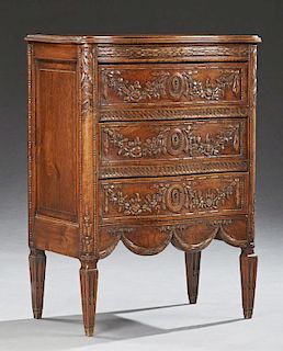 Diminutive Louis XV Style Carved Oak Bowfront Commode, 19th c., the rounded edge top over three carved drawers, on tapered sq