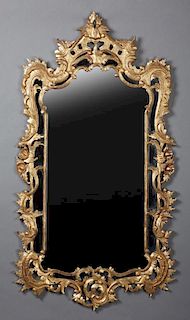 Gilt Florentine Louis XV Style Gilt Mahogany Overmantle Cushion Style Mirror, early 20th c., the pierced leaf decortaed crest
