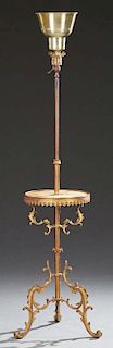 French Bronze Organ Lamp, 19th c., the adjustable light over a circular onyx table on a cylindrical support on tripodal scrol