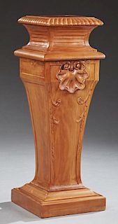 French Louis XVI Style Carved Cherry Pedestal, 20th c., the square carved edge top over a tapered square support, on a steppe