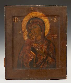 Russian Icon, 19th c., of the Virgin of Kazan, oil and gilt on curved wooden panel, H.- 12 3/8 in., W.- 10 3/8 in.